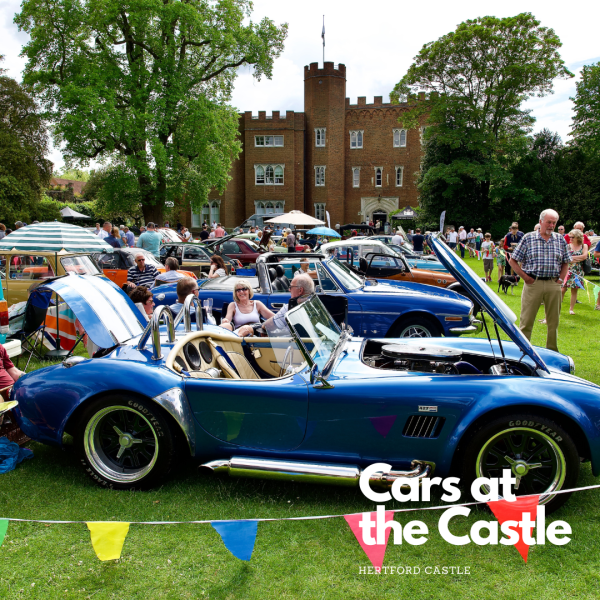 yellow car on display outside hertford castle 