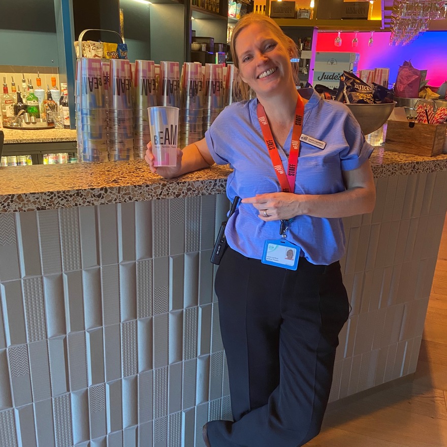 Laura at BEAM, Herford - with Refill logos on their reusable cups